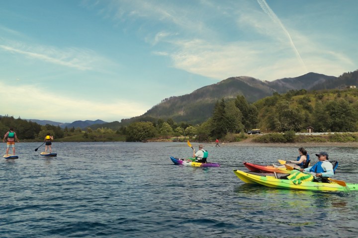 a group of people in a small boat in the Columbia River